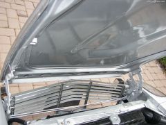 Dents on this side...filler on that-restoration at its best!