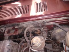 Engine compartment with undercoting to be removed