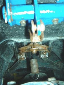 Handbrake return spring