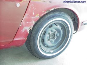 1973 240Z rusty wheel arch