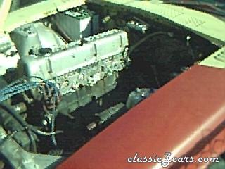 73 240z - Engine striped of smog crap.