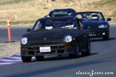 A Miata and Viper behind me