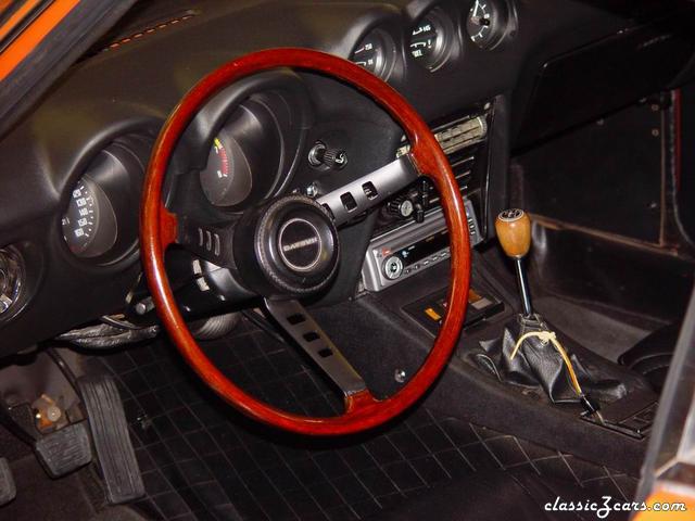 Steering wheel with rim reglossed