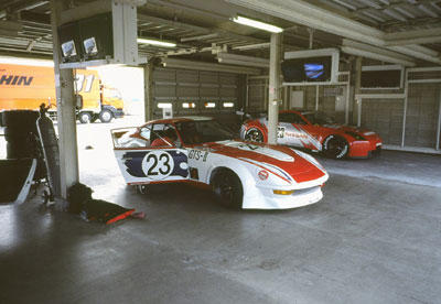 Works 240ZR and Z33 racer in pits