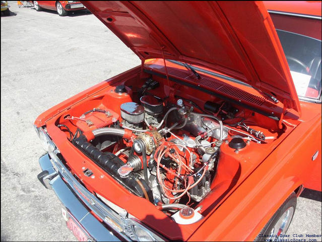 engine of the funky red-orange 510 wagon