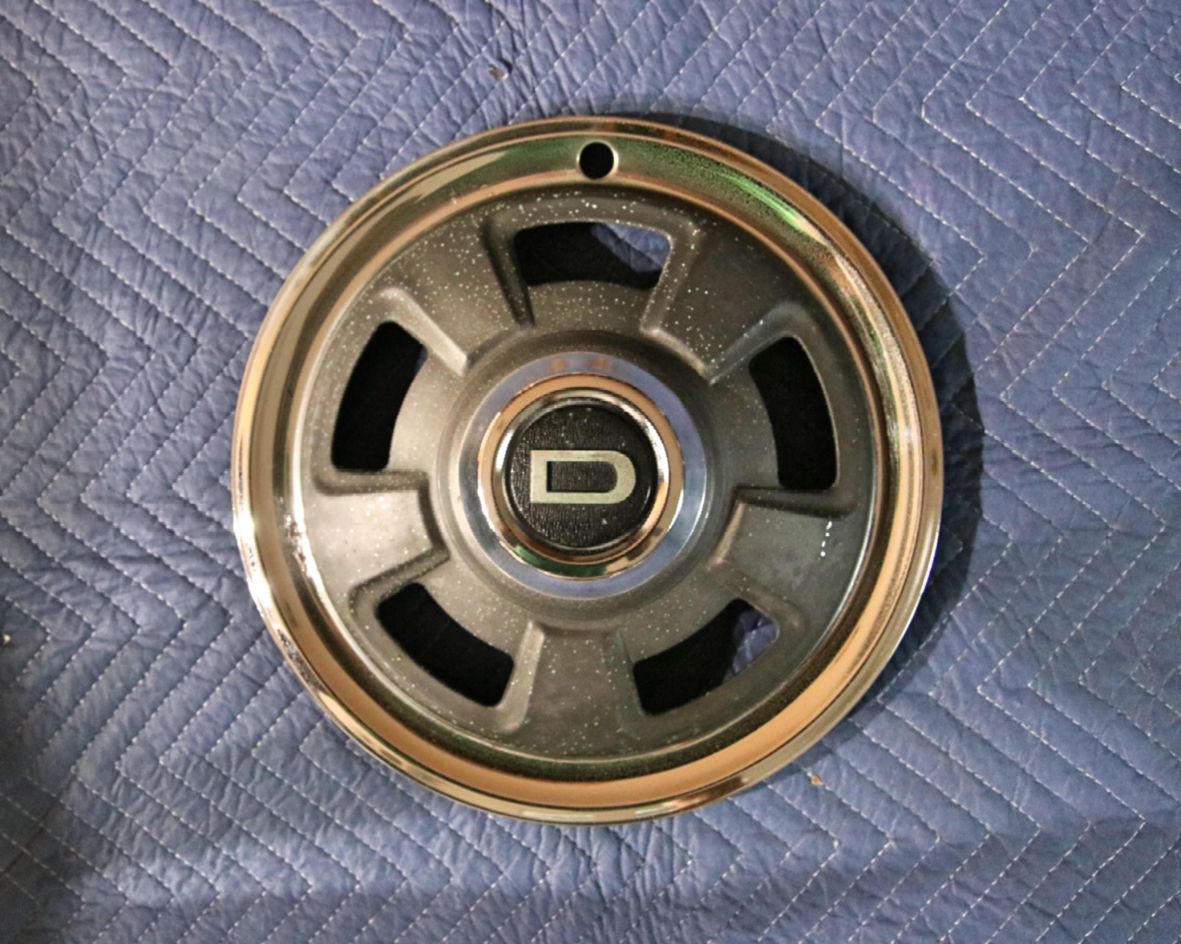 Datsun 240Z set of four hubcaps
