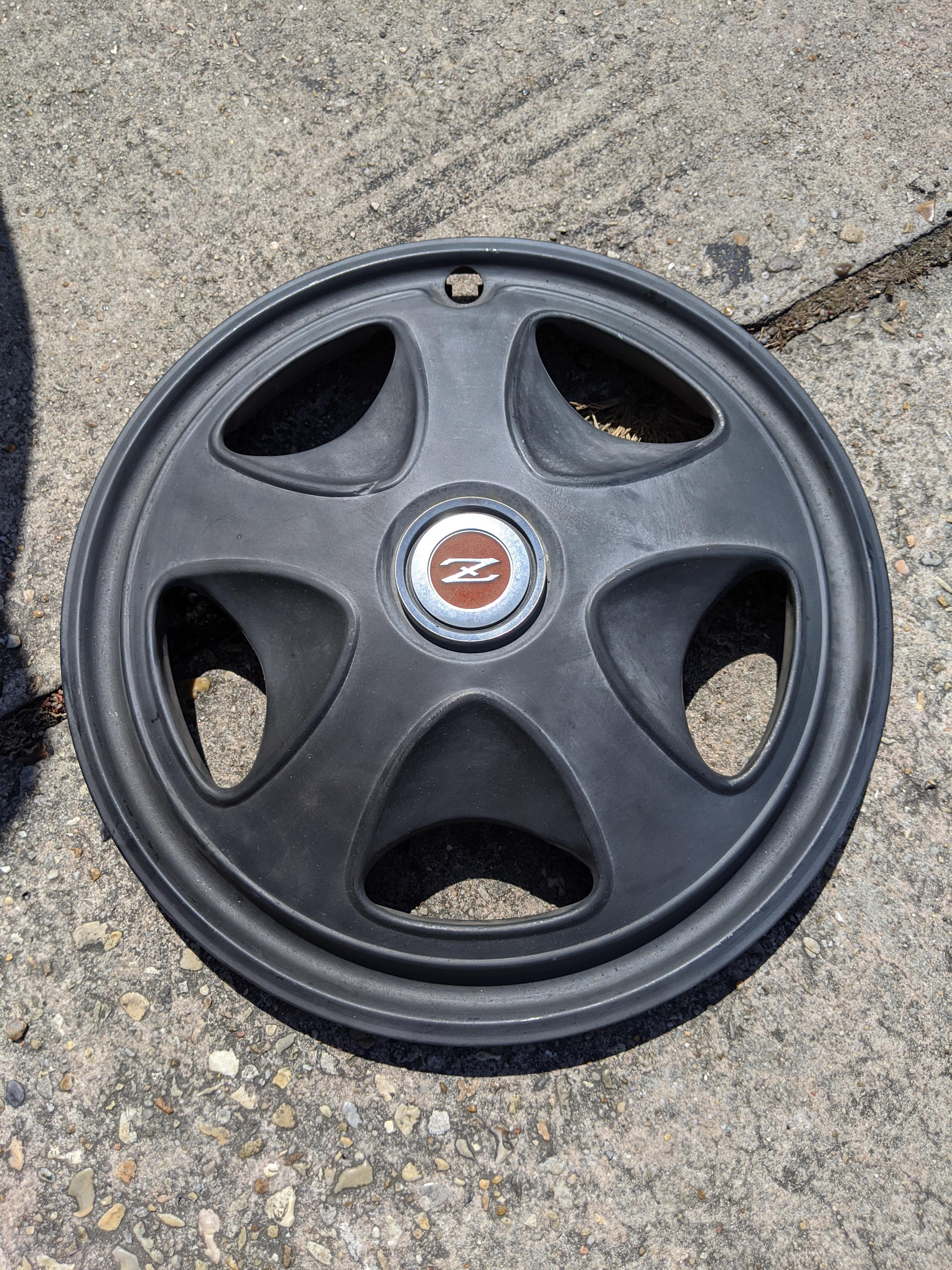240z hubcaps deals