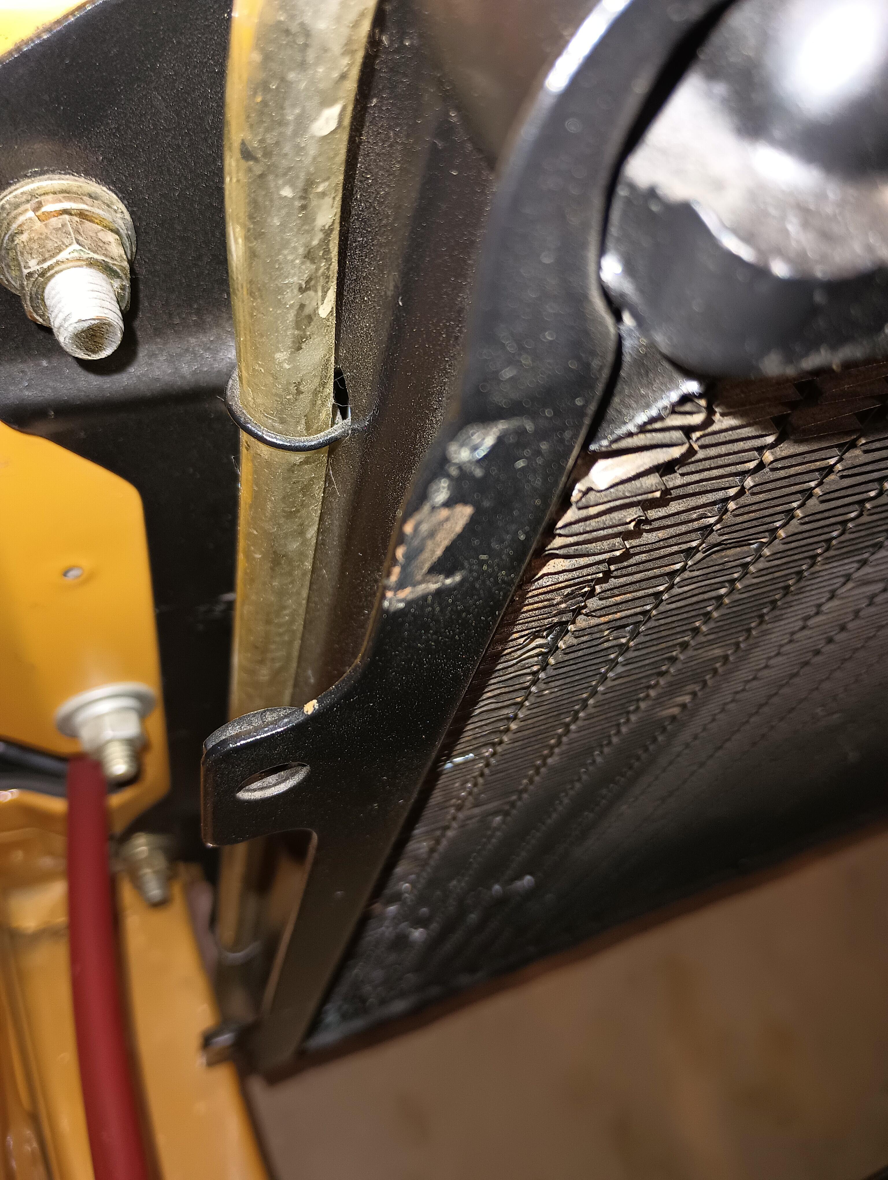 240z Radiator overflow hose "clips"?